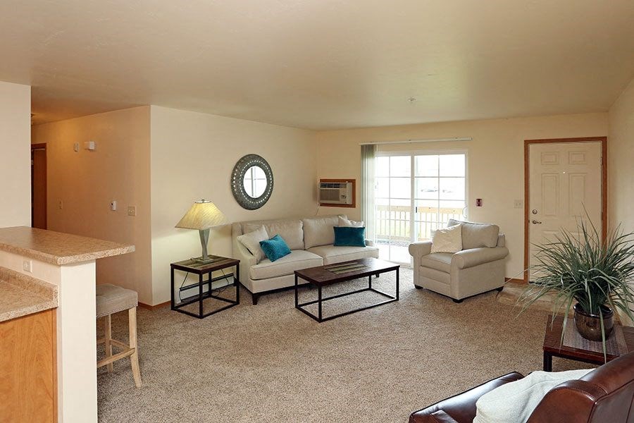 a living room with a couch and a table