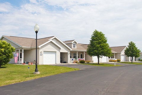 a house with a street lamp in front of it
