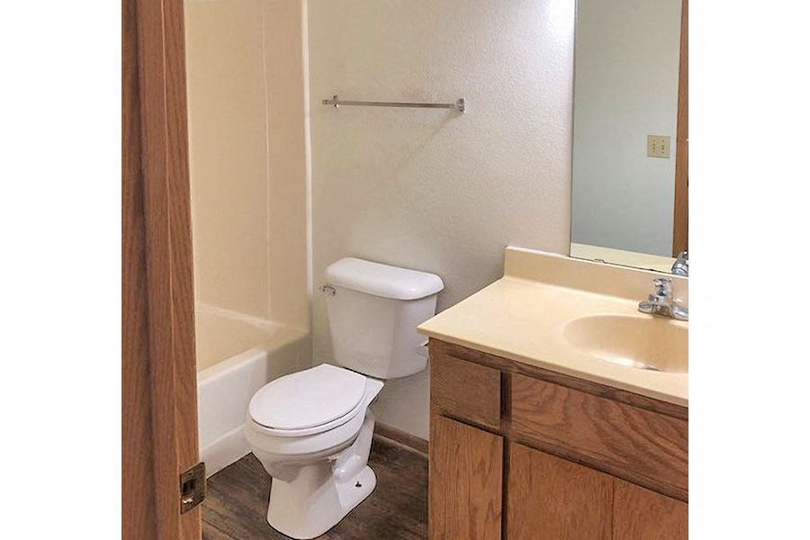 a bathroom with a toilet and a sink