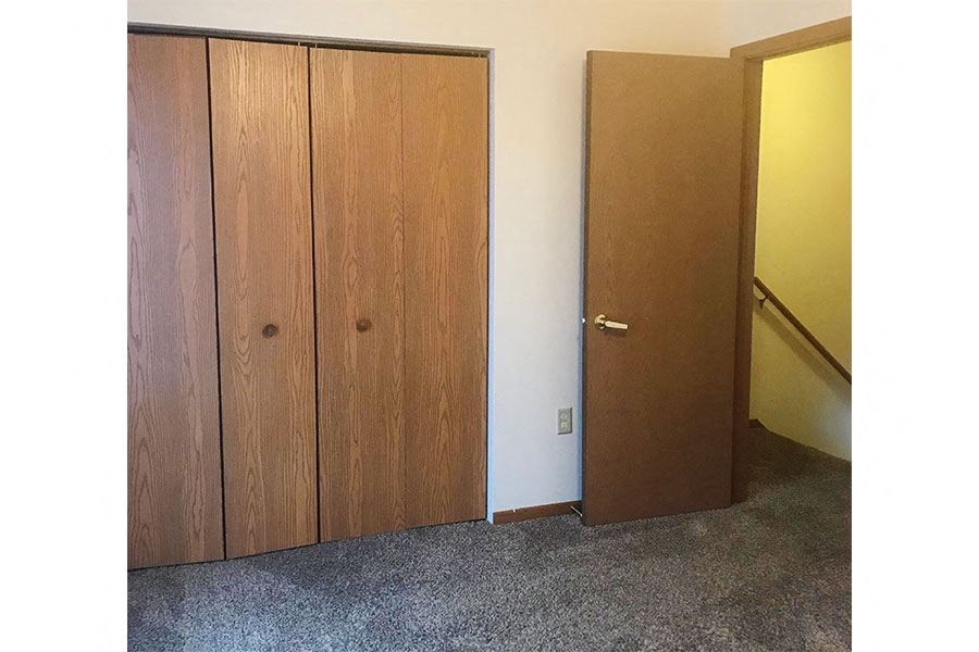 a closet and a door in a room