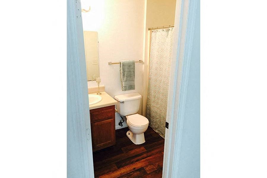 a small bathroom with a toilet and a sink