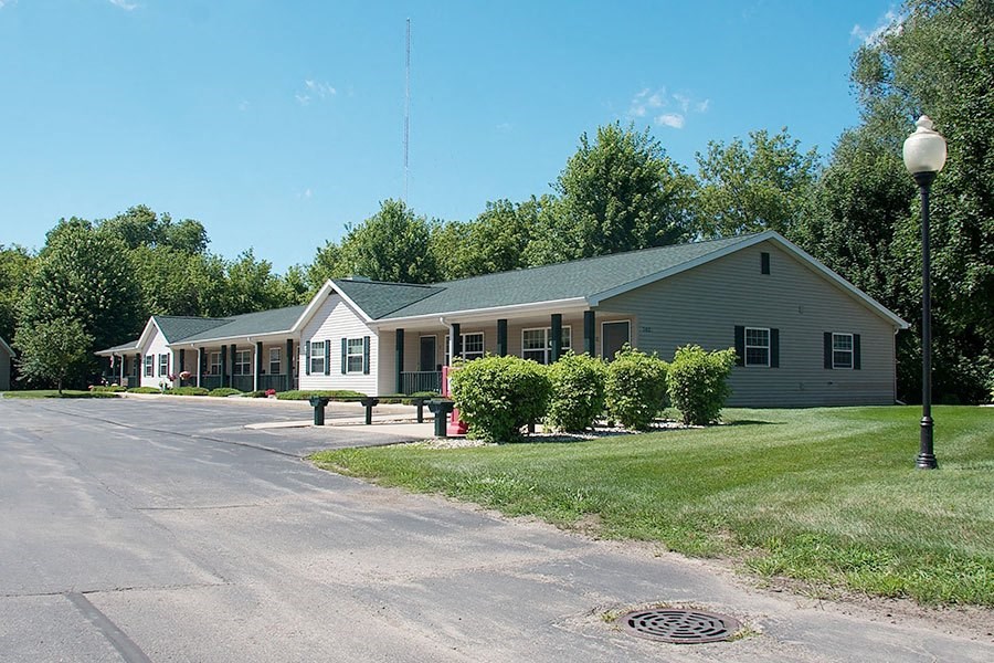 a building with a picnic table in front of it