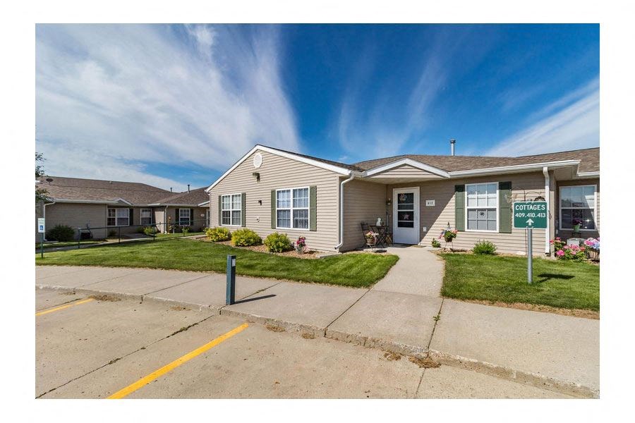 a house with a street sign in front of it