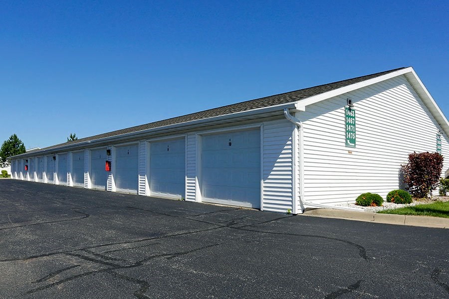 a white building with a sign on the side of it