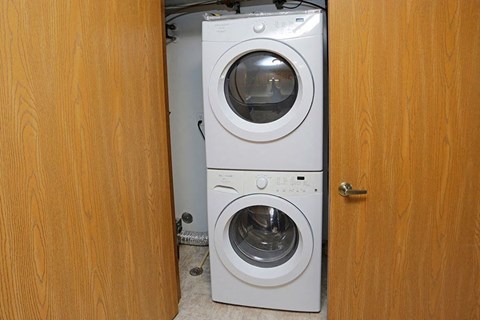 a white washer and dryer in a door