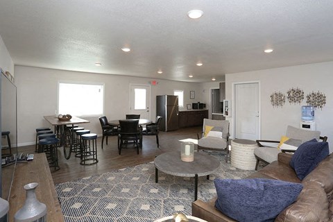 a living room with a couch and a table