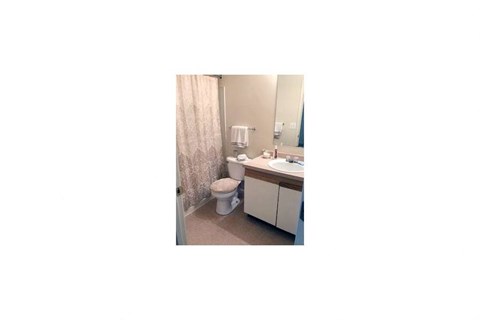 a small bathroom with a toilet and a sink