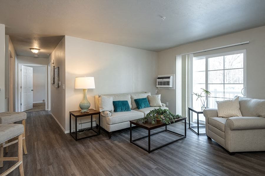 a living room with a couch and a table