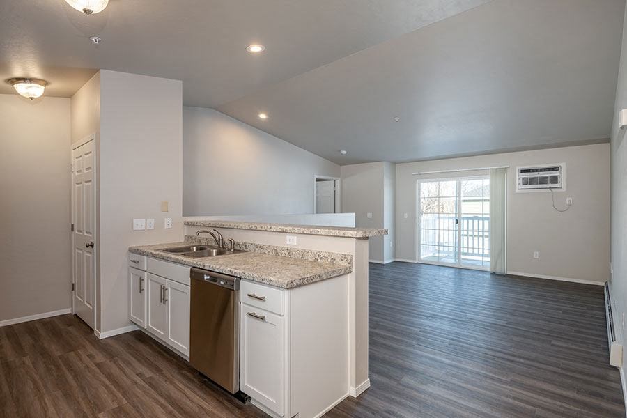 a kitchen with a sink and a counter top