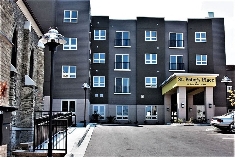 a building with a parking lot in front of it