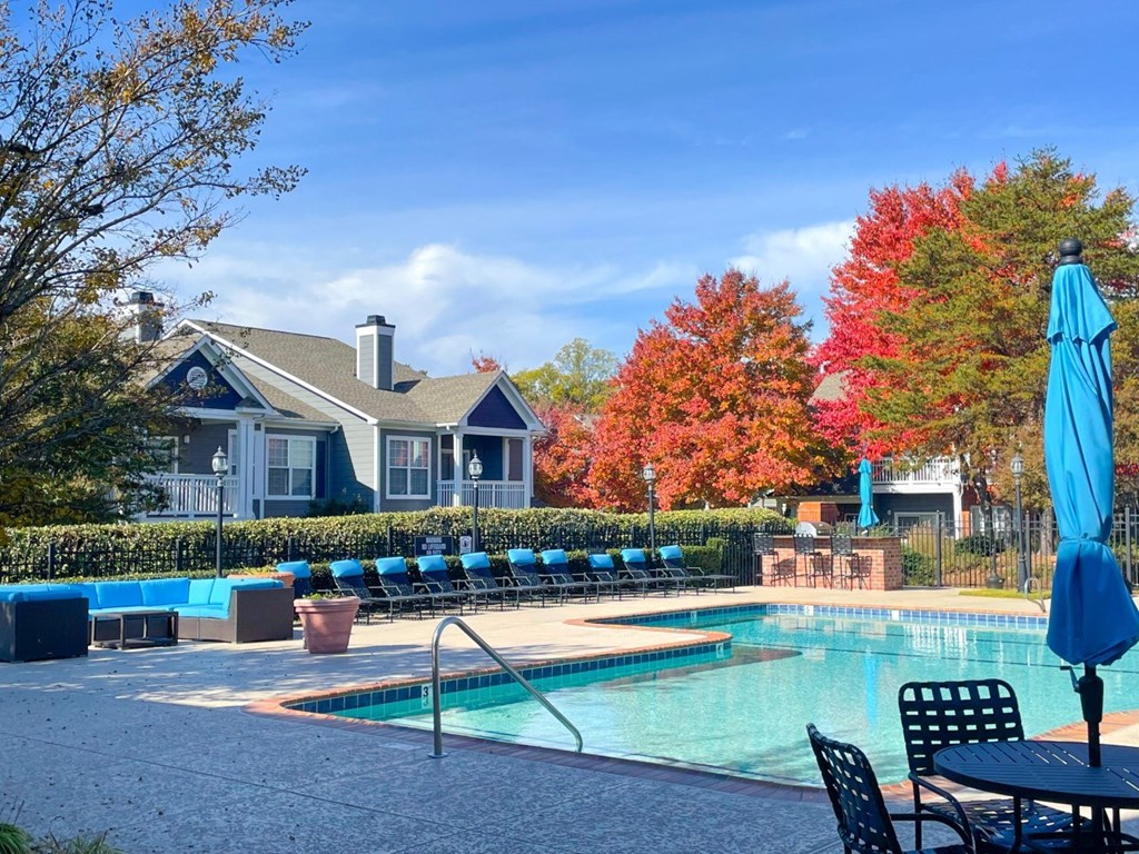 pool and fall leaves on trees at Reserve at Bridford, North Carolina, 27407