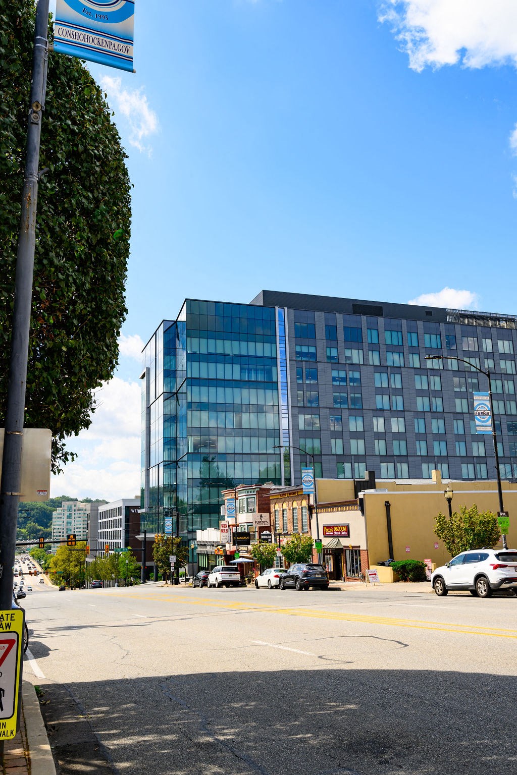a view of a city street with a tall building at Madison West Elm, Pennsylvania