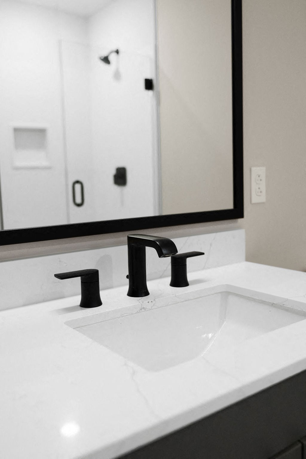 a bathroom with a sink and a mirror at Madison West Elm, Conshohocken, PA, 19428