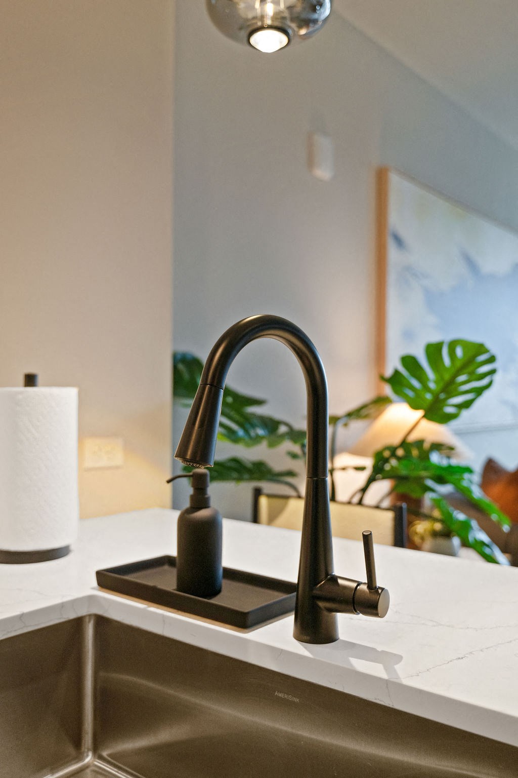 a close up of a kitchen sink with a faucet at Madison West Elm, Conshohocken, Pennsylvania