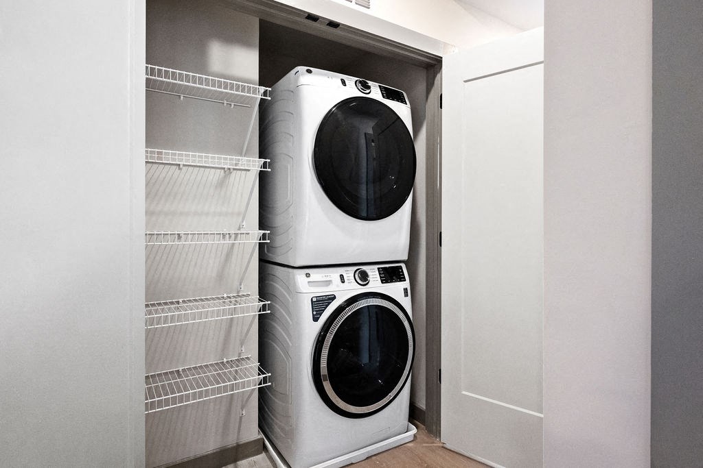 a washing machine and dryer in a closet at Madison West Elm, Conshohocken