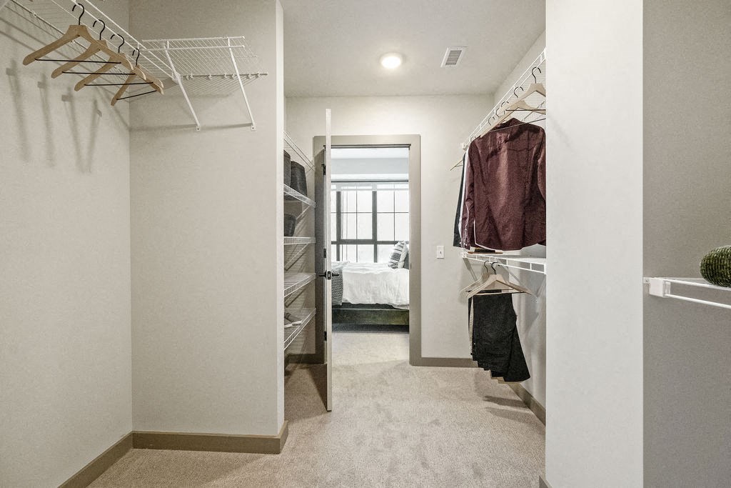 a room with a bed and a ladder in it at Madison West Elm, Conshohocken