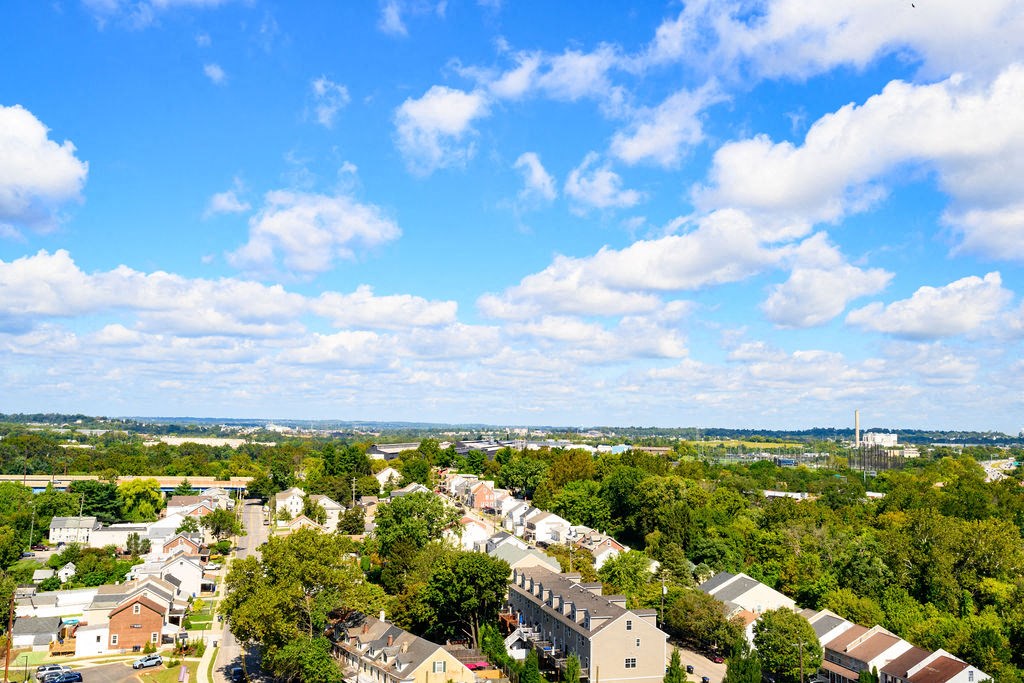 an aerial view of a neighborhood with houses and trees at Madison West Elm, Conshohocken, PA