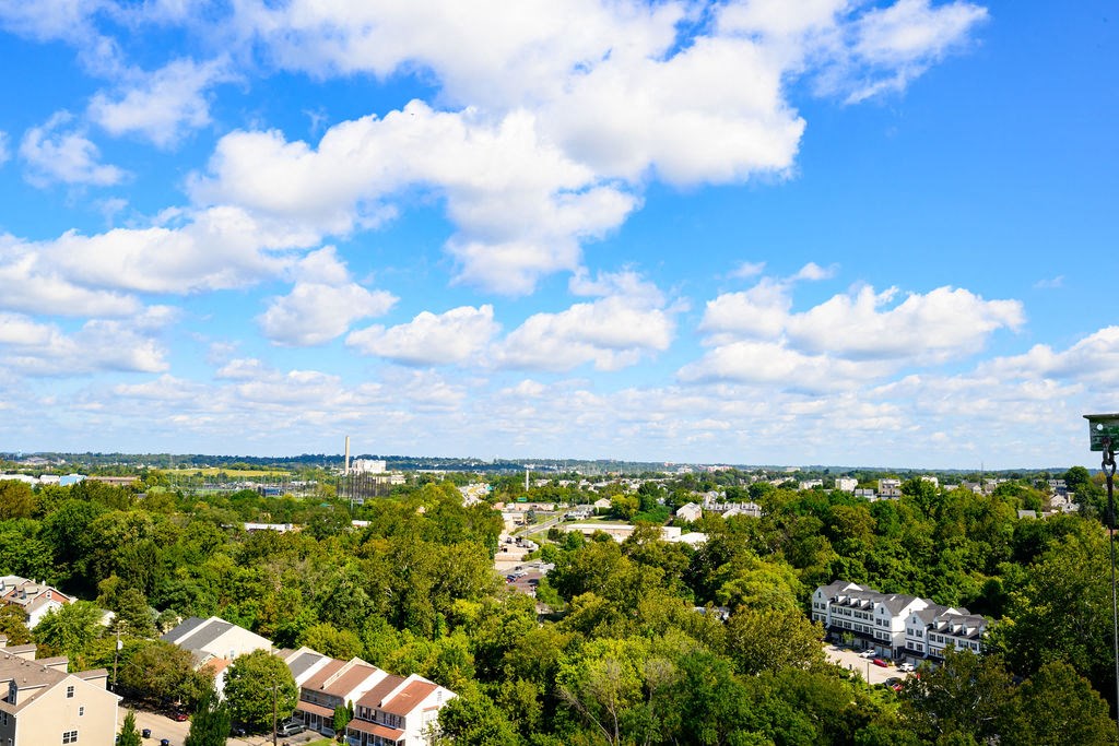 an aerial view of a city with trees and buildings at Madison West Elm, Pennsylvania, 19428