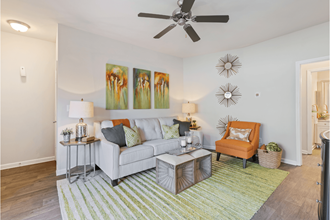 Living Room With Ceiling Fan at Reserve at Bridford, North Carolina, 27407