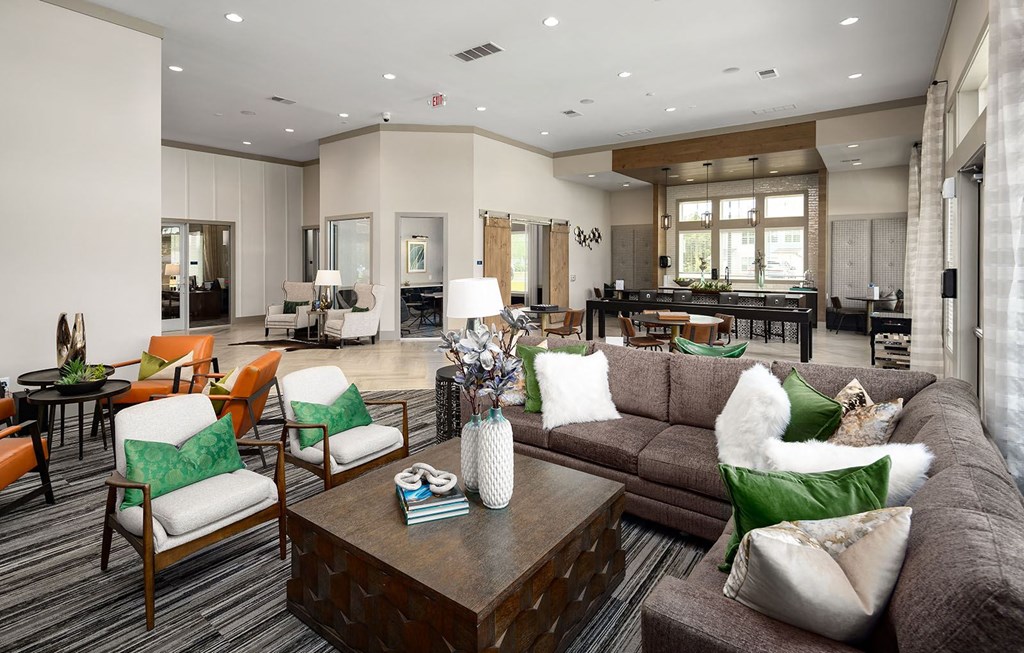 Clubhouse interior  with seating  areas at Carmel Vista, McDonough, 30253