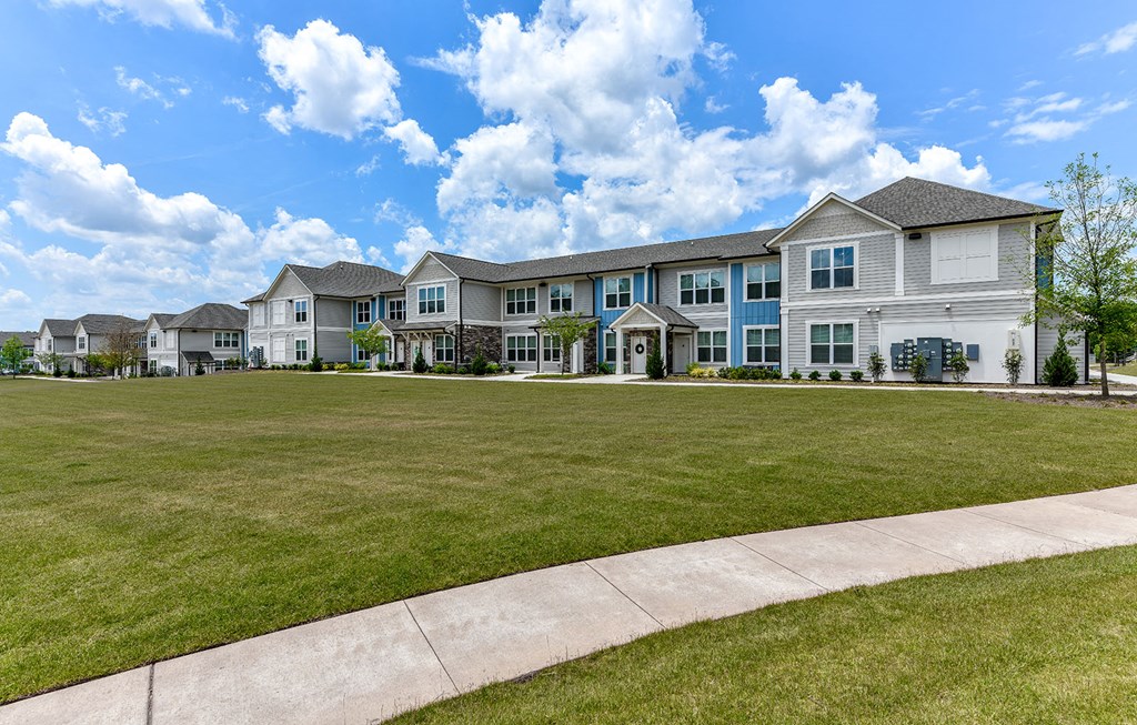 apartment community with walking path at Carmel Vista, McDonough, GA