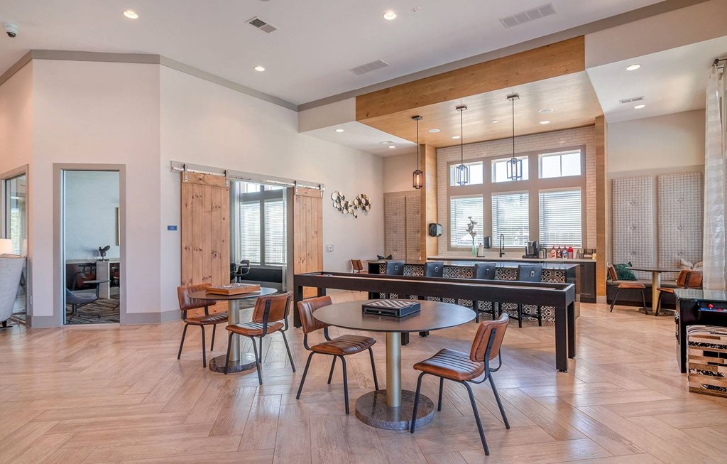 a kitchen and dining room with a table and chairs at Carmel Vista, McDonough, Georgia