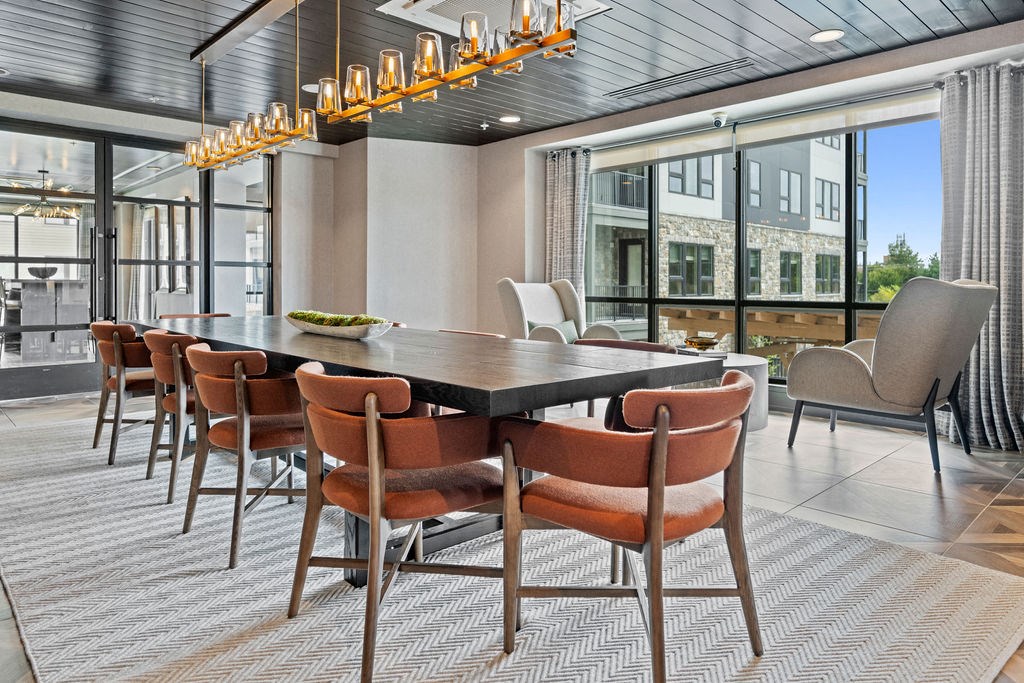 a dining room with a large table and chairs at The Harrison, Newtown Square, 19073