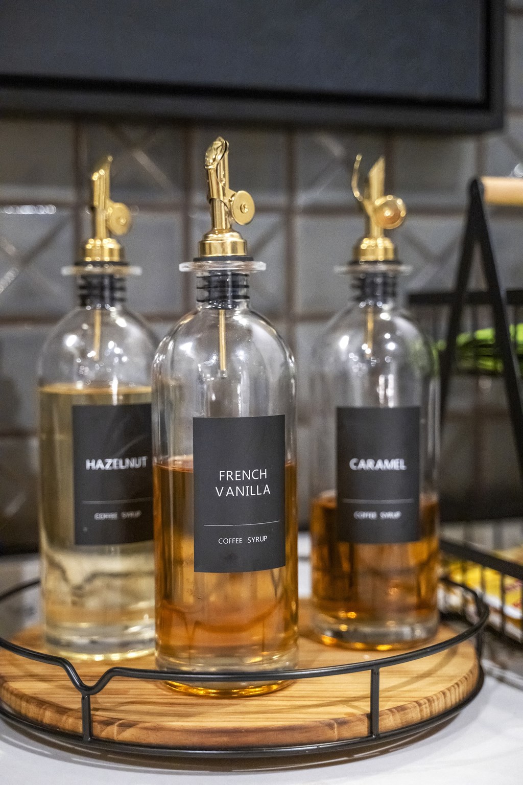a trio of perfume bottles on a tray at The Harrison, Newtown Square