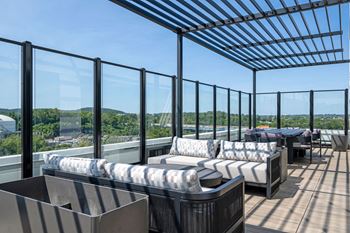 a terrace with couches and tables on a roof at Madison West Elm, Conshohocken Pennsylvania