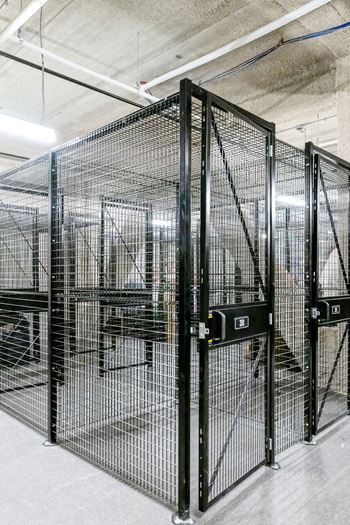 a group of cages in a building with doors at Madison West Elm, Conshohocken