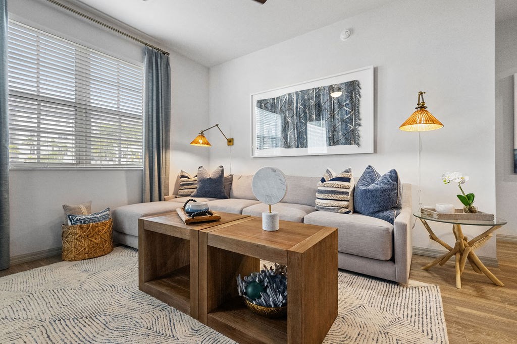 a living room with a couch and a coffee table at Inspira, Florida, 34113