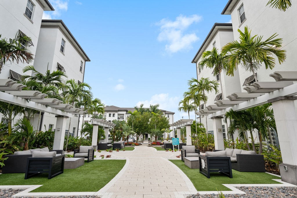 a view of the courtyard at the grove resort  spa at Inspira, Naples, FL
