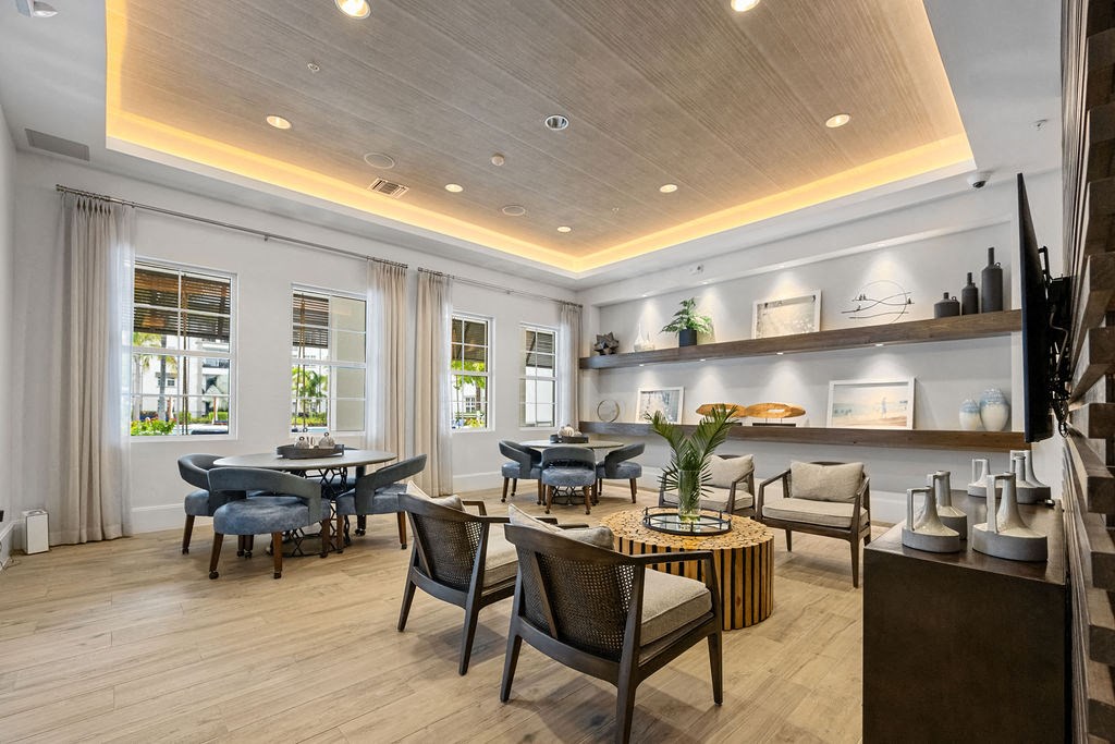 Game tables and lounge area for residents at Inspira, Florida