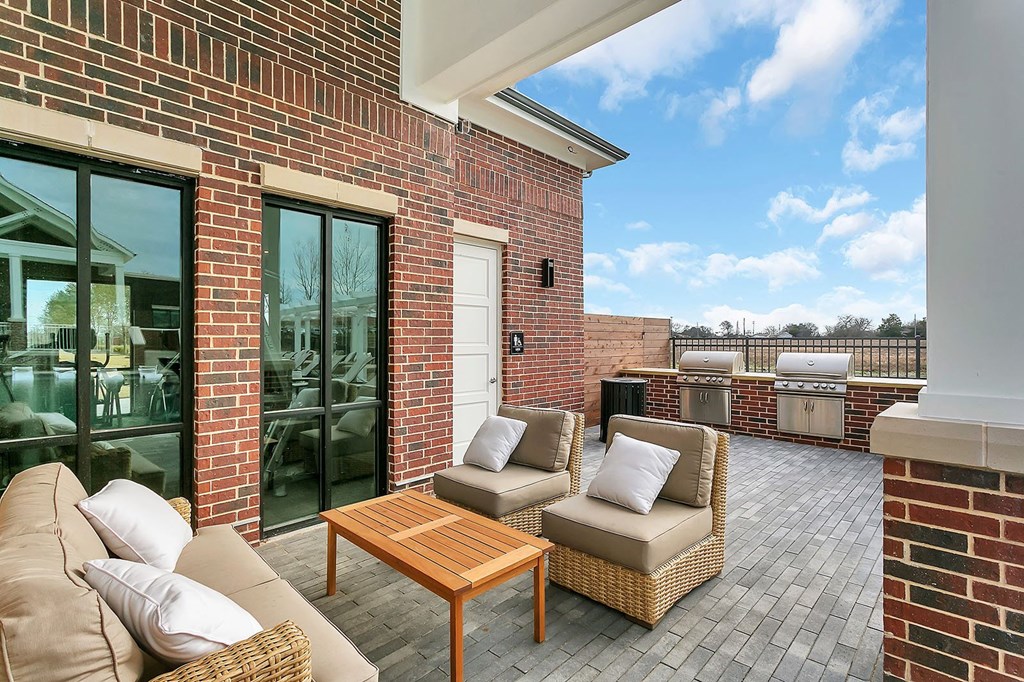 Outdoor seating and the Grilling station with 2 gas grills and an ice maker at McKinney Village, Texas, 75069