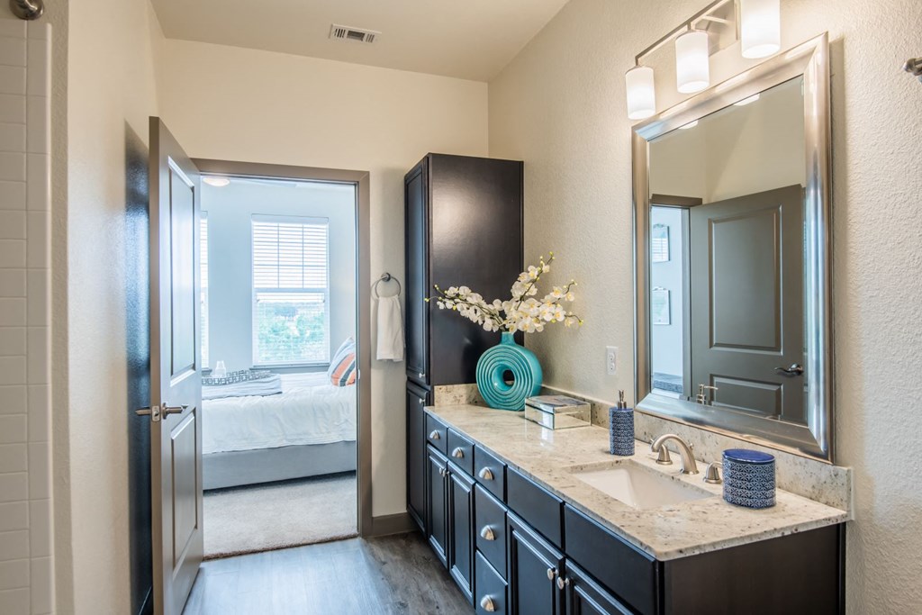 Renovated Bathrooms With Quartz Counters at McKinney Village, McKinney, TX, 75069
