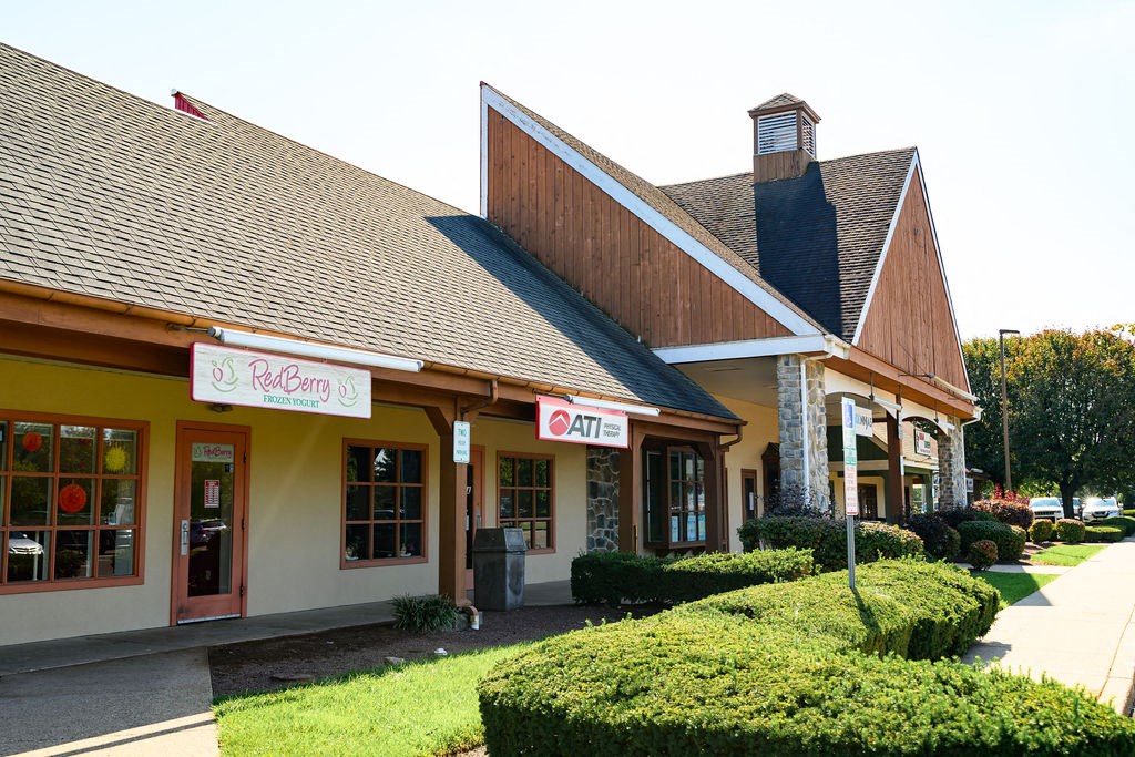 A building with a red roof and a sign that says "Dairy Queen" at Madison Prickett Preserve, Pennsylvania