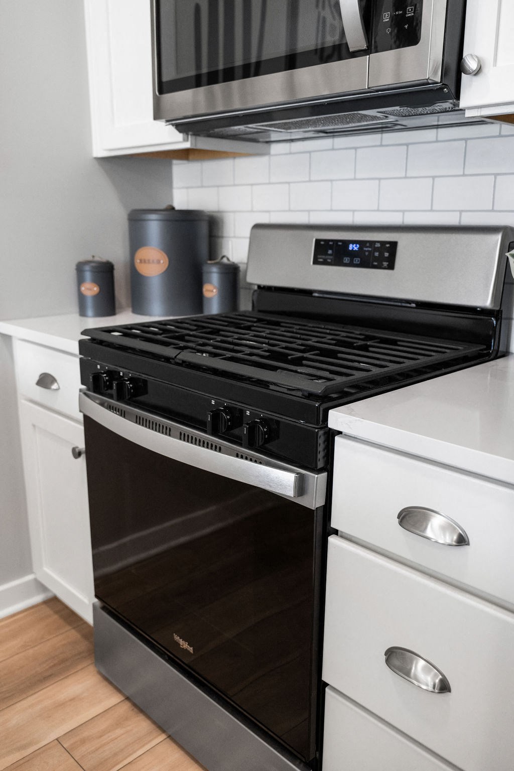 A modern kitchen with a stainless steel oven and microwave above it. at Madison Prickett Preserve, Yardley, 19067