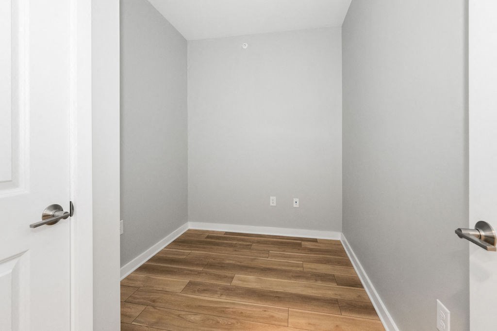 A room with a white door and a wooden floor at Madison Prickett Preserve, Yardley, 19067