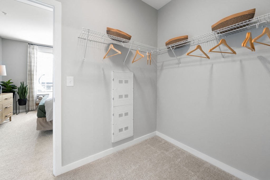 A room with a white wall and a white closet with clothes hangers at Madison Prickett Preserve, Pennsylvania, 19067