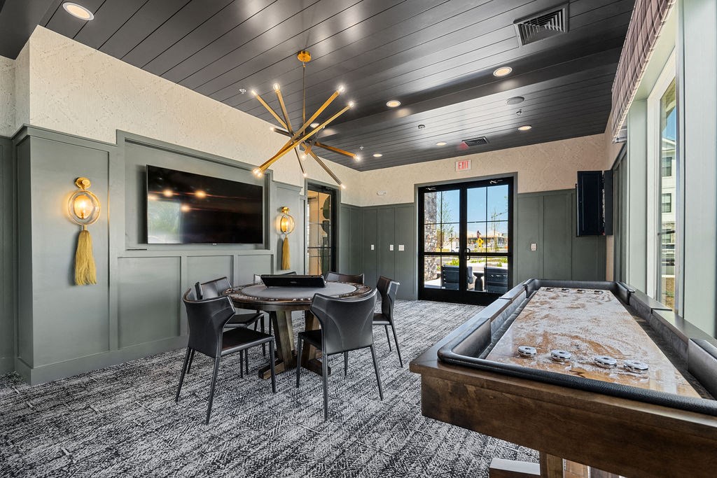 A room with a pool table and a television at Madison Prickett Preserve, Pennsylvania, 19067
