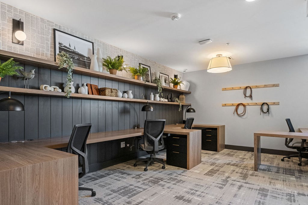 a home office with desks and chairs and a wall with shelves at Madison Prickett Preserve, Pennsylvania