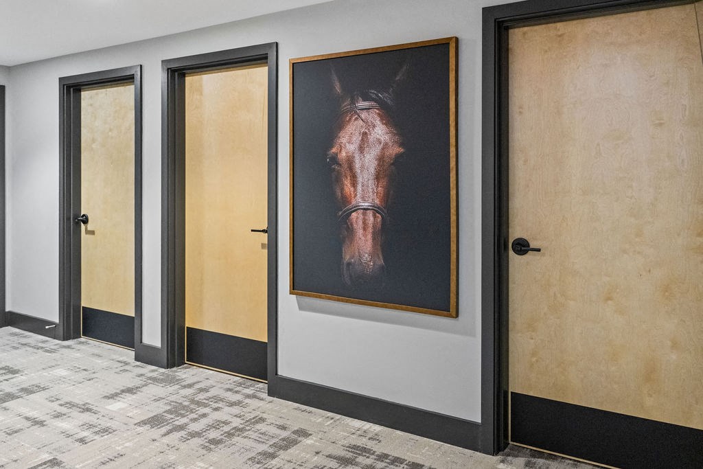 a painting of a horse hangs on a wall in a hallway at Madison Prickett Preserve, Yardley Pennsylvania