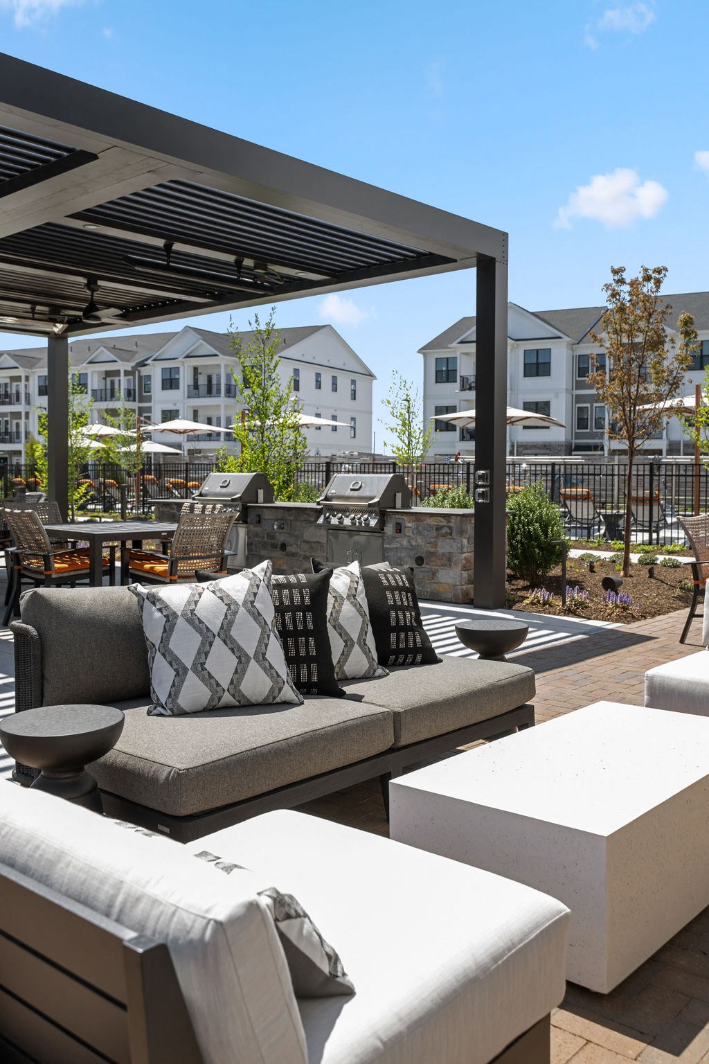 a patio with couches and tables and a pergola at Madison Prickett Preserve, Yardley Pennsylvania