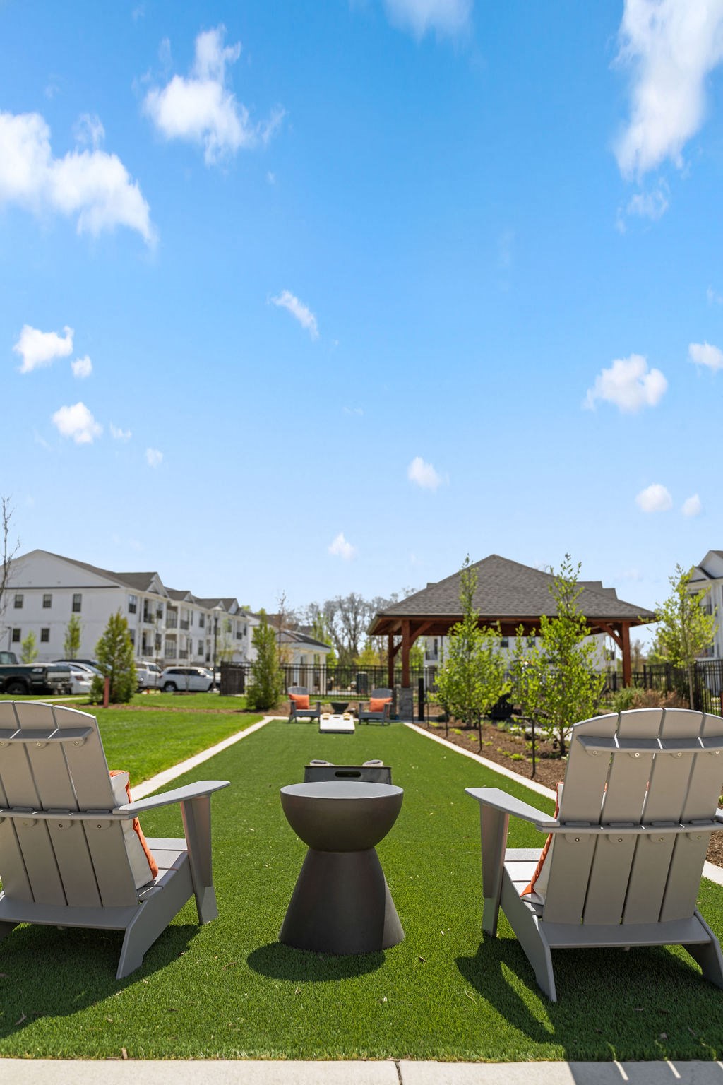 a patio with lounge chairs and a fire pit at Madison Prickett Preserve, Yardley, PA