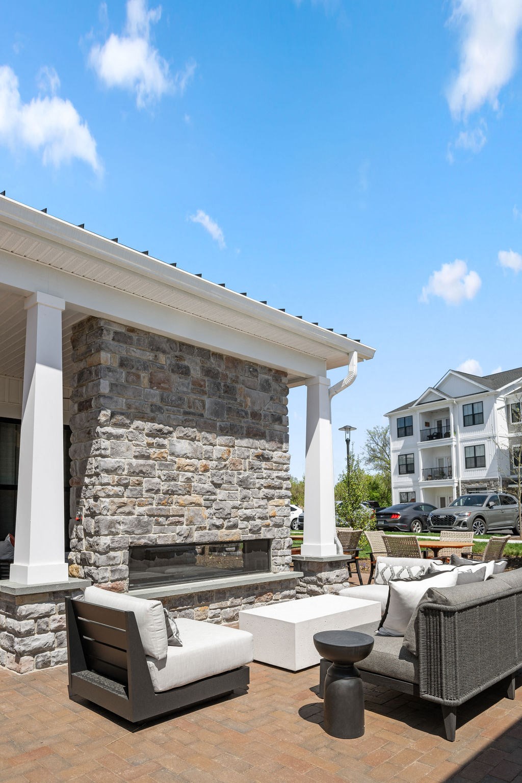 a rendering of a patio with couches and a fireplace at Madison Prickett Preserve, Yardley