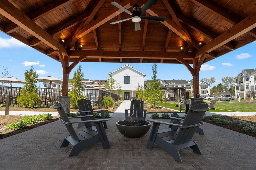A wooden gazebo with a ceiling fan and four chairs at Madison Prickett Preserve, Pennsylvania, 19067