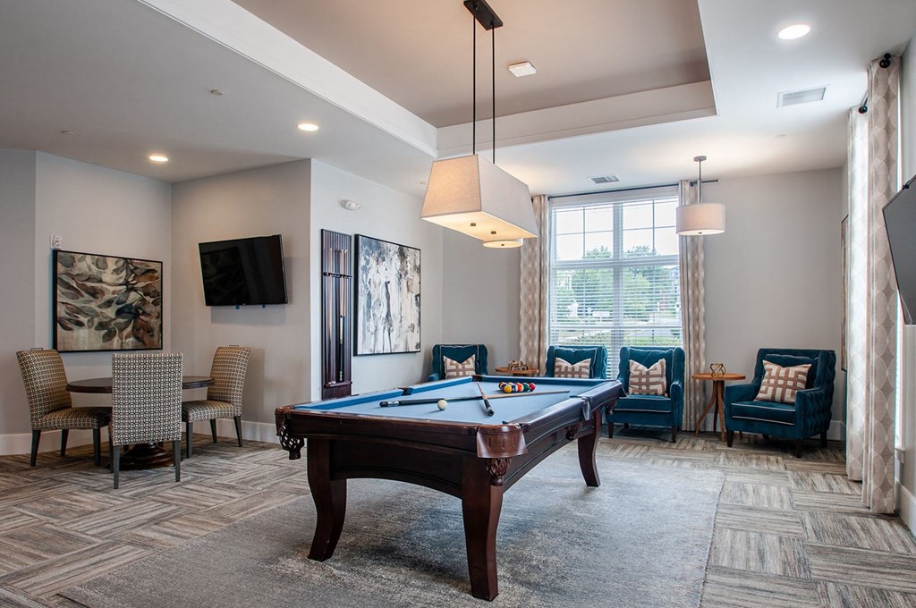 the reserve at bucklin hill leasing office game room with pool table and flat screen tv  at Madison Providence, Collegeville, PA