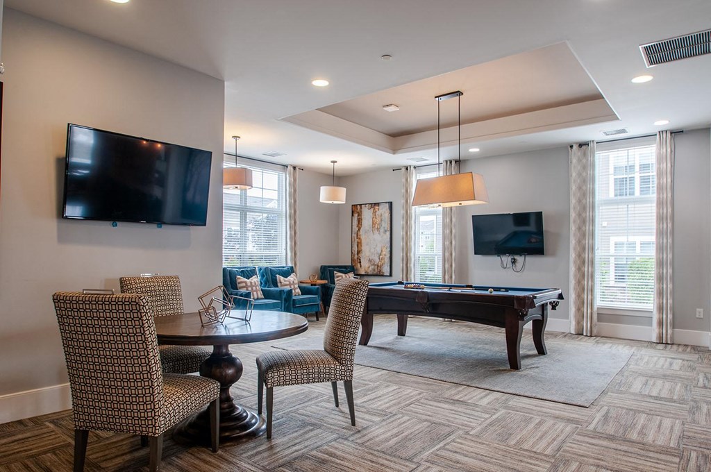 a game room with a foosball table and a flat screen tv  at Madison Providence, Collegeville, PA