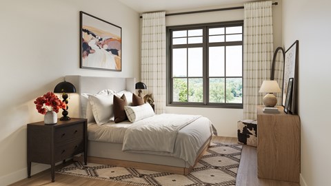 A bedroom with a bed, nightstand, and a window with a view of trees.