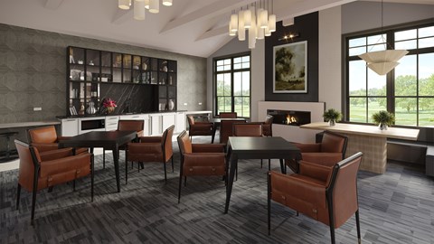 A lounge with a dark wood table and brown leather chairs.